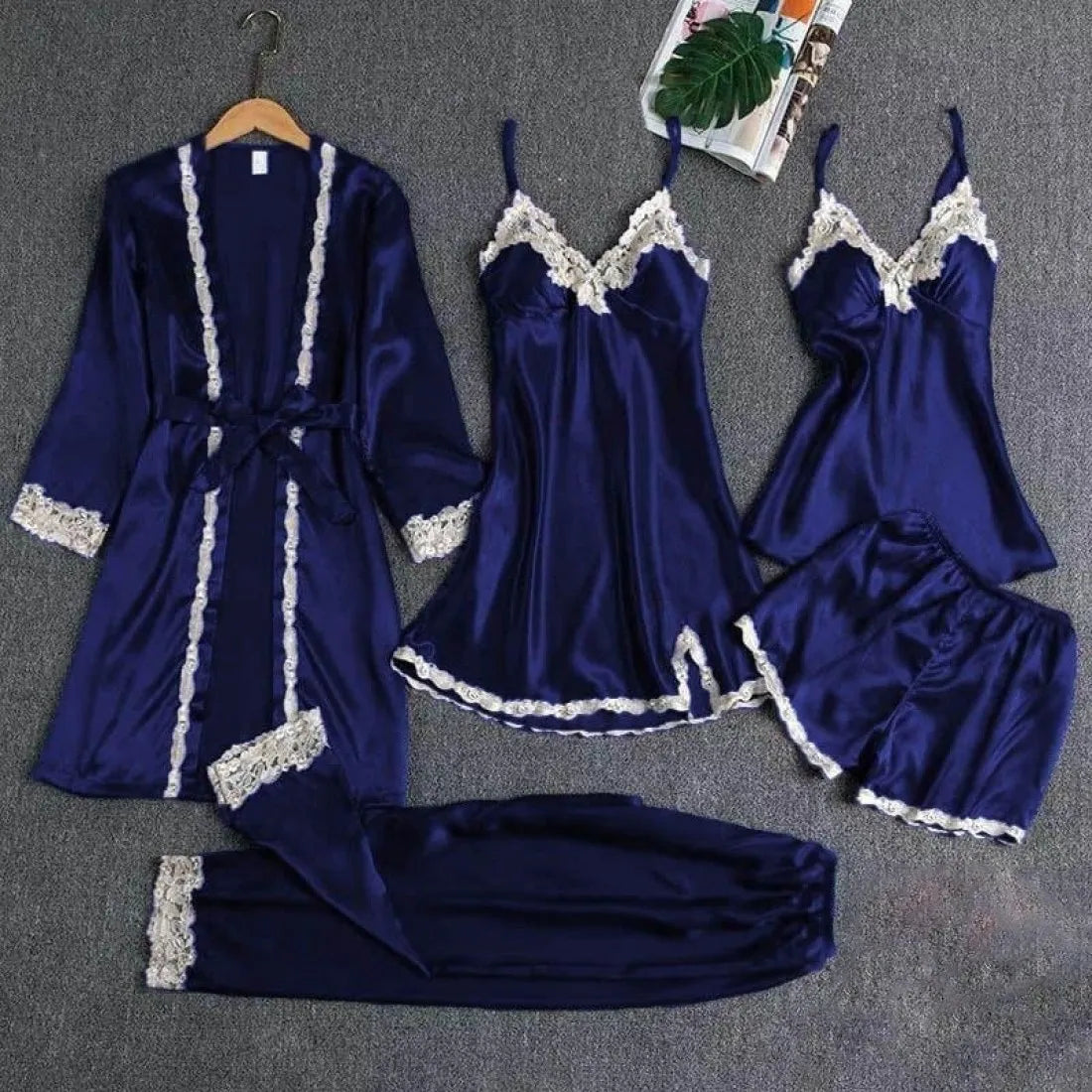 Elegant navy blue satin nighty dress in Pakistan – 5-piece set featuring robe, cami, shorts, pants, and slip with white lace trim from Sajiero.