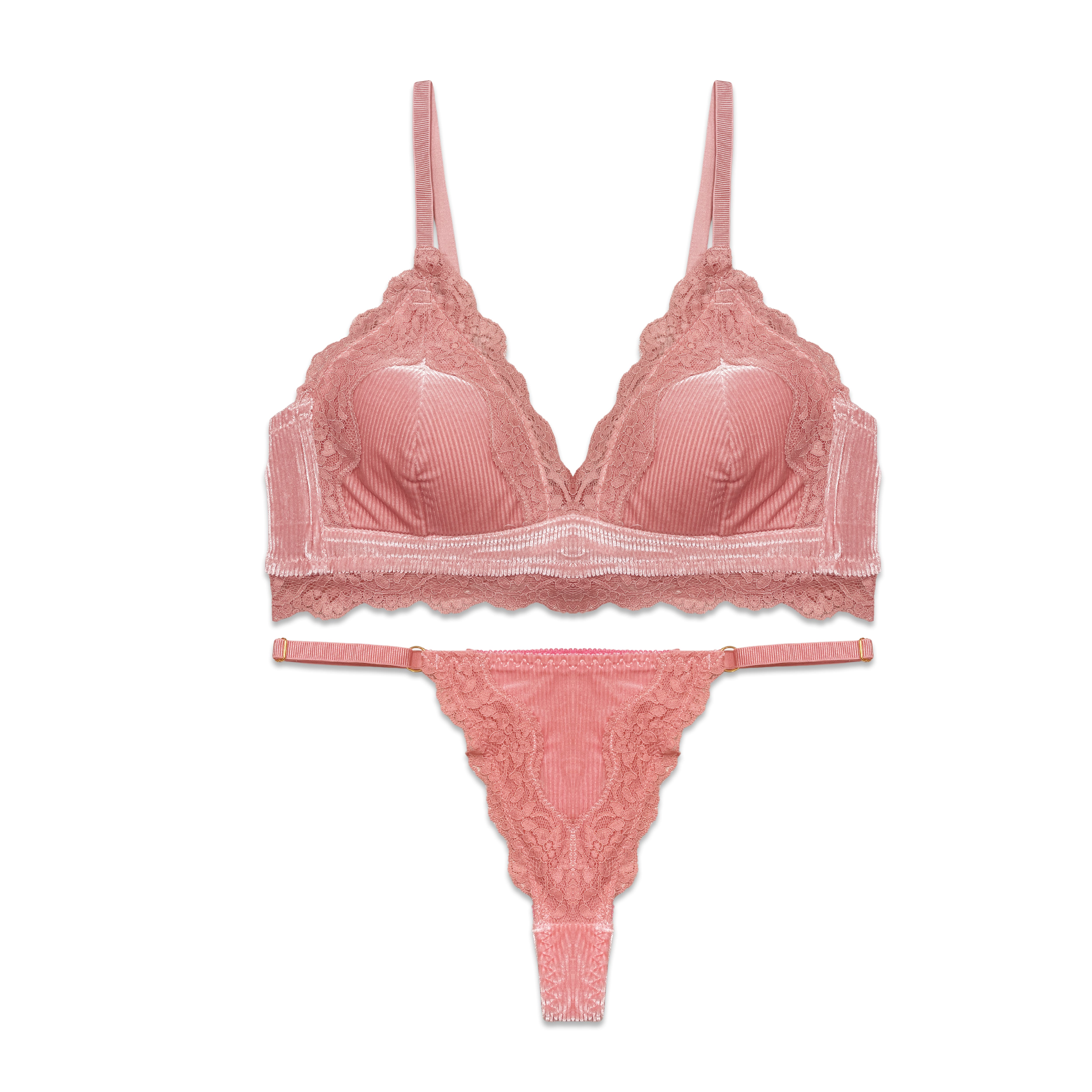 Pink lace lingerie set on a white background