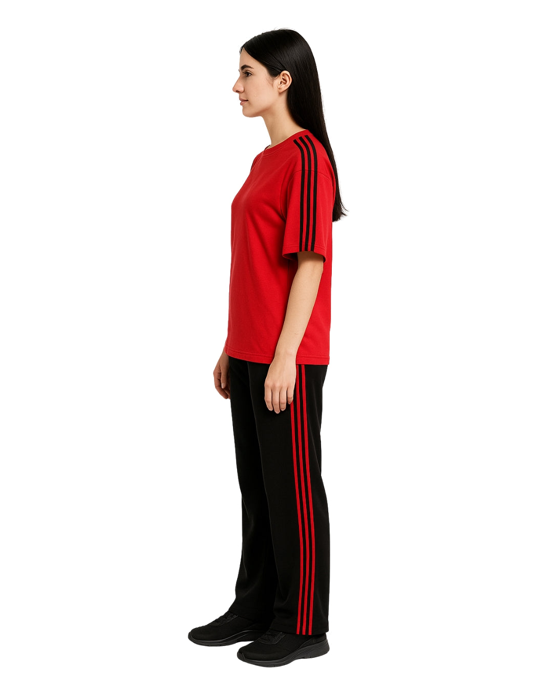 Person wearing a red shirt and black pants with red stripes on a white background