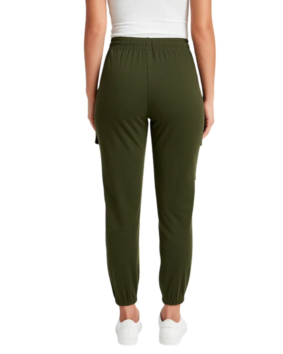 Green jogger pants worn by a person on a white background