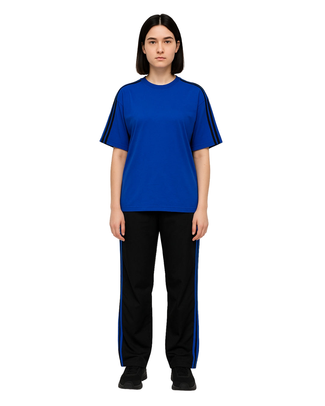 Person wearing a blue shirt and black pants with blue stripes on a white background